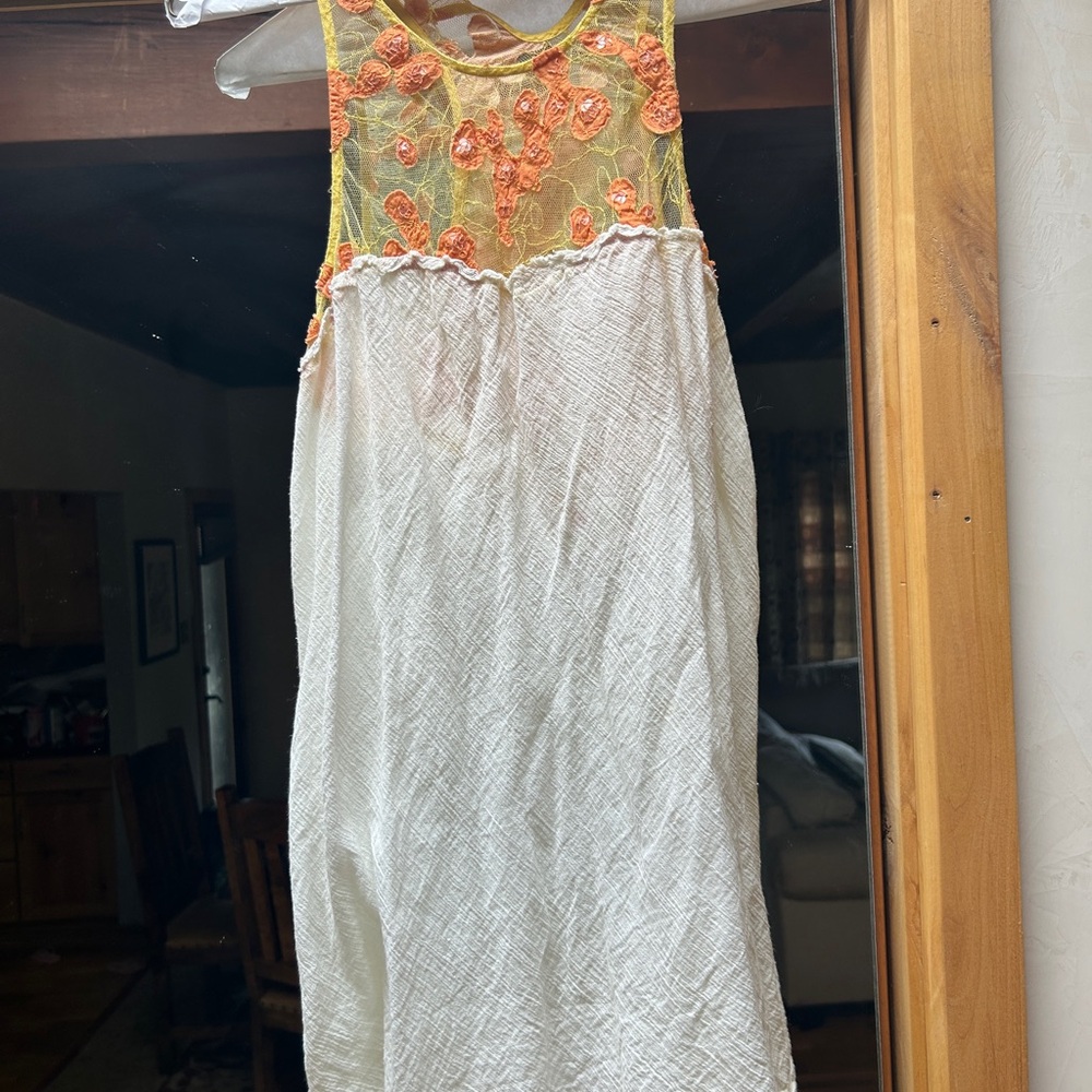 Free People tank top with sequin and flower embellishment